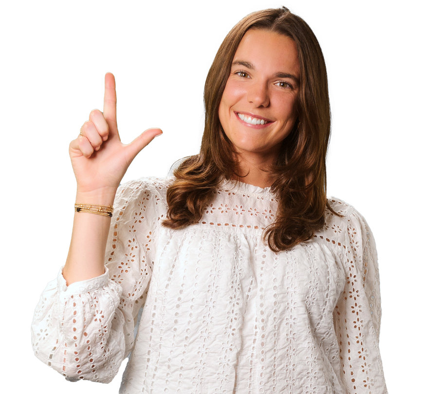 Paige Snyder in a white shirt holding hand in L shape