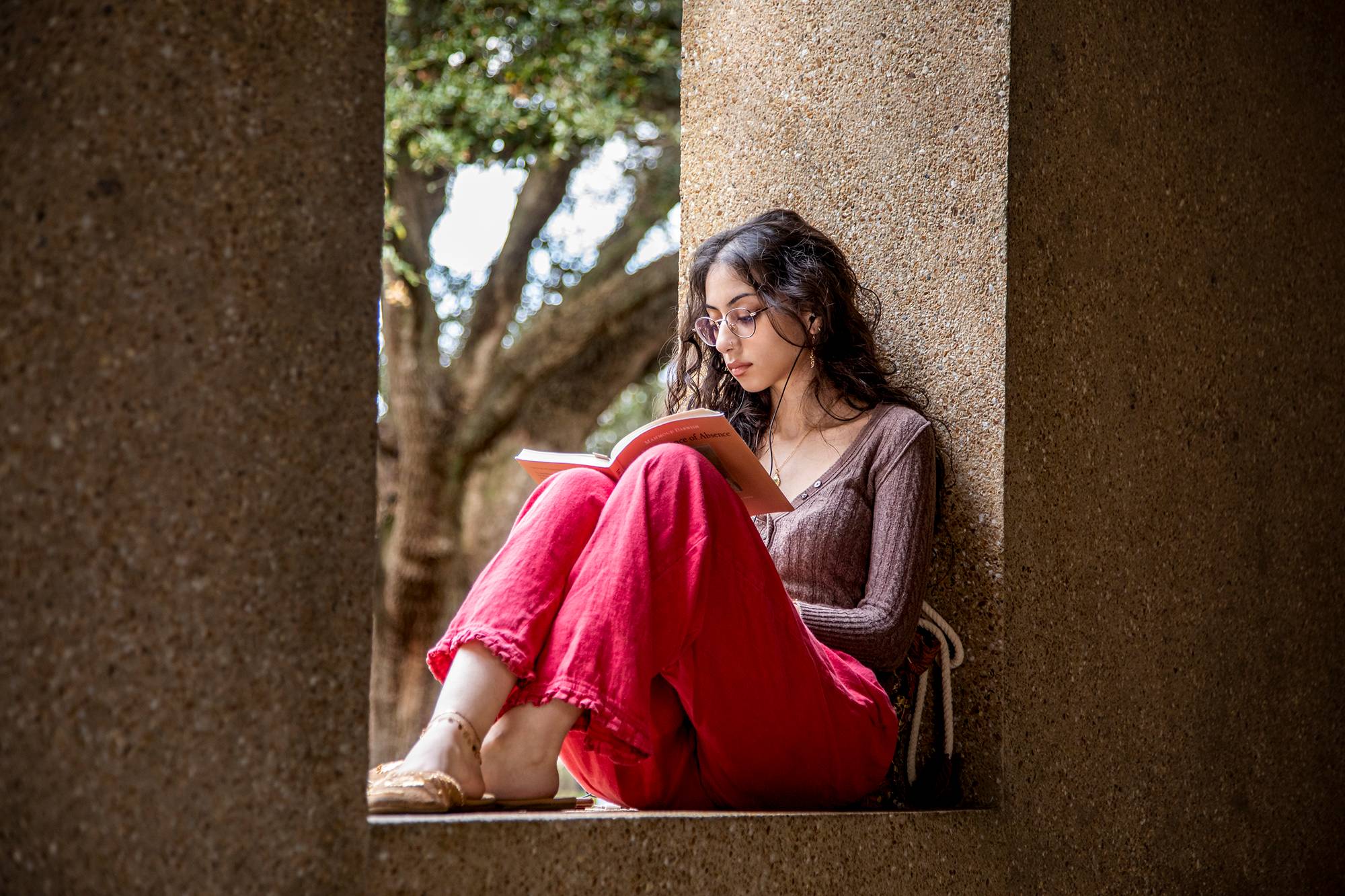 student studying on campus