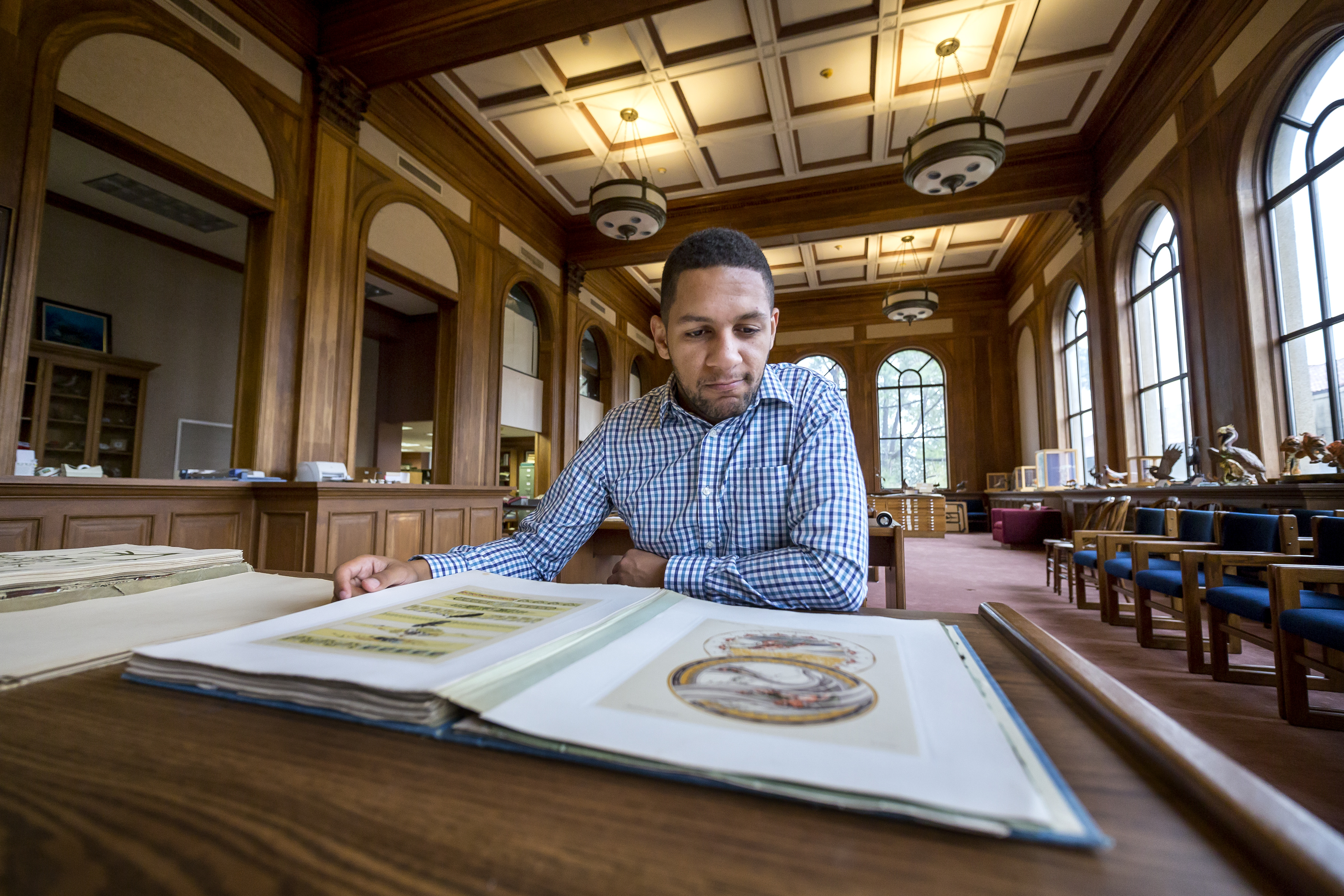 Student reading in library